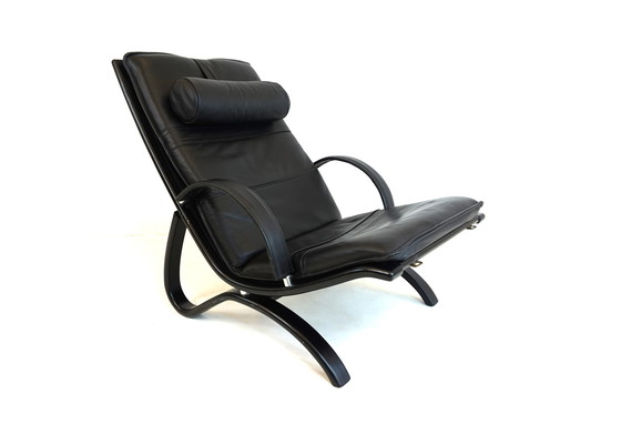 Image 1 of Nelo Zweden lederen fauteuil met poef