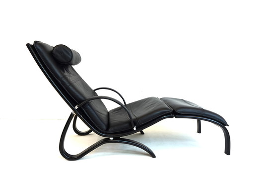 Image 1 of Nelo Zweden lederen fauteuil met poef