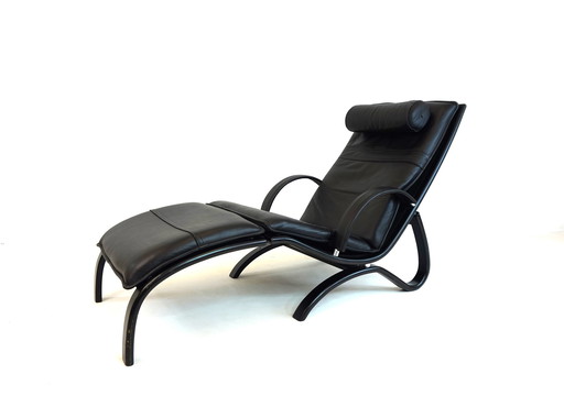 Nelo Zweden lederen fauteuil met poef