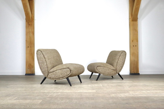 Image 1 of 2x Norman Bel Geddes Fauteuils in Hout en originele Wol stof