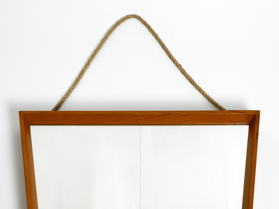 Image 1 of Mooie grote Mid Century wandspiegel in trapeziumvorm met een massief kersenhouten frame