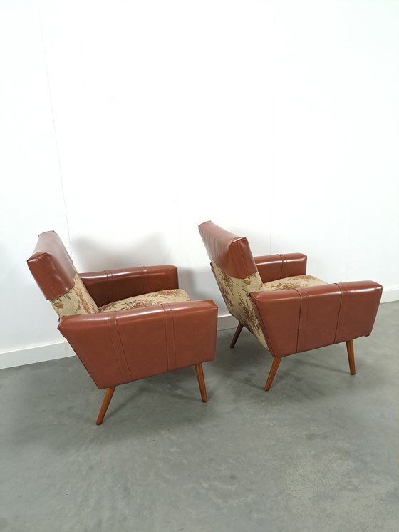 Image 1 of Fauteuils met bloemen bekleding en kunstleder