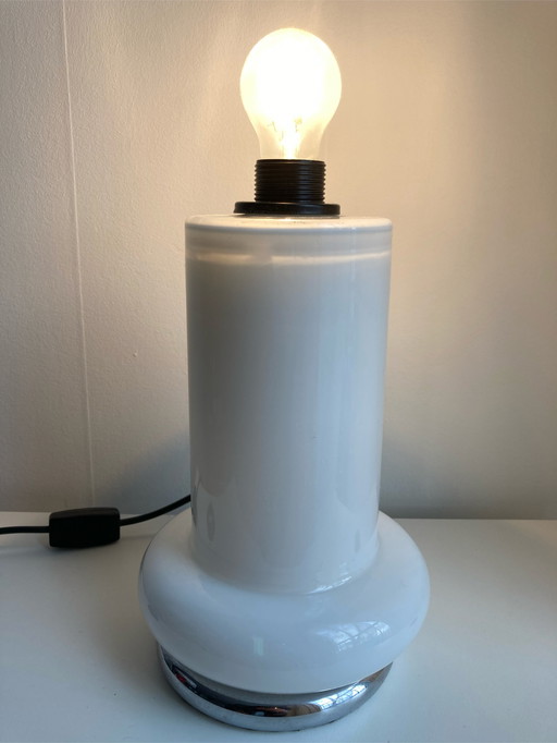 Glazen lamp met zilveren ring