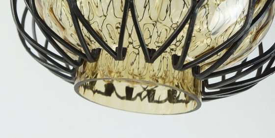 Image 1 of Hanglamp van rookglas uit het mid century 60 met metalen frame 