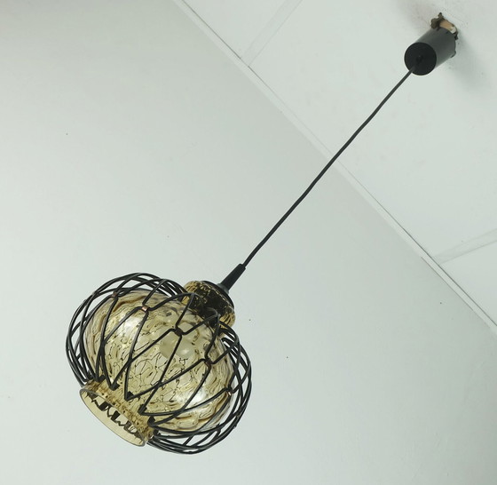 Image 1 of Hanglamp van rookglas uit het mid century 60 met metalen frame 