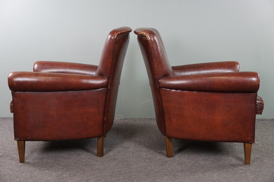 Image 1 of Set van twee schapenleren fauteuils/ armchairs met hoge rug