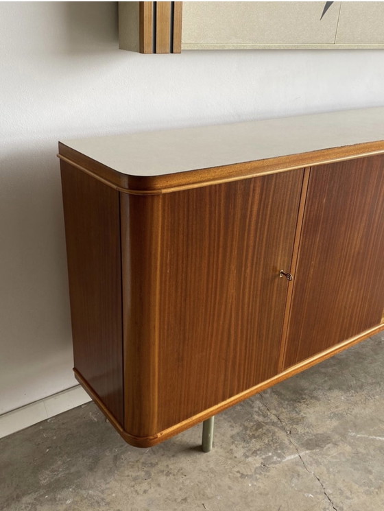 Image 1 of Vintage dressoir en bijpassend decoratief Kunst van het cruiseschip "SS Rotterdam"