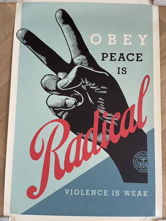 Image 1 of Vrede is radicaal, ondertekend en gedateerd door Shepard Fairey (OBEY)