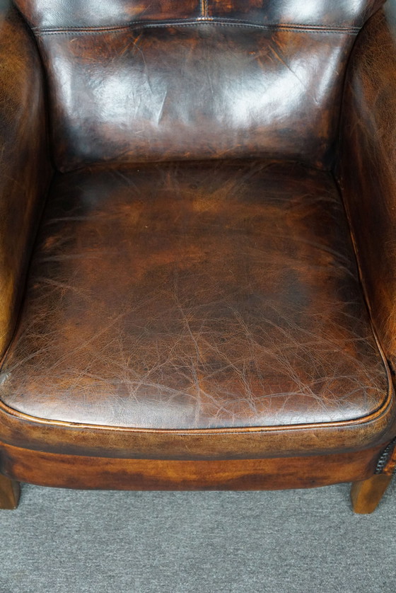 Image 1 of Statige schapenleren fauteuil, comfortabele zit en hoge rug