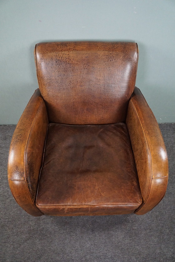 Image 1 of Strak vormgeven schapenleren design fauteuil