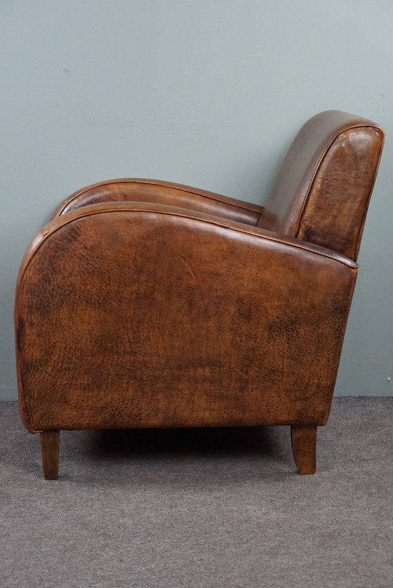 Image 1 of Strak vormgeven schapenleren design fauteuil