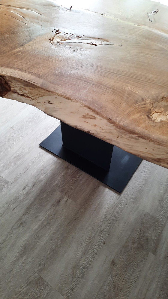 Image 1 of Robust solid oak tree trunk table.