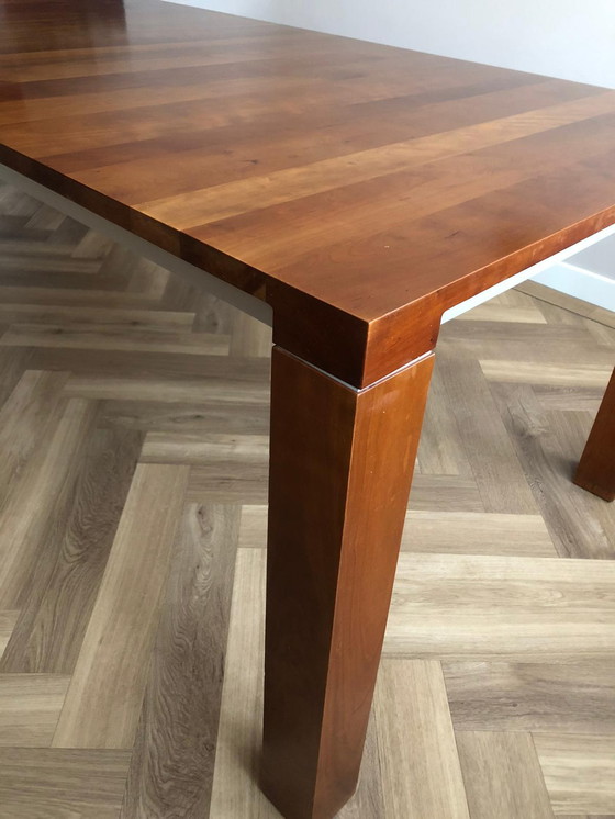 Image 1 of Leolux dining table Vivre in Cherry wood