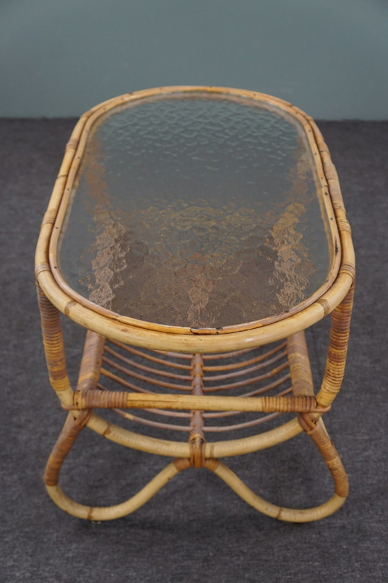 Image 1 of Dutch Design Style coffee table with cloud glass top and reading basket