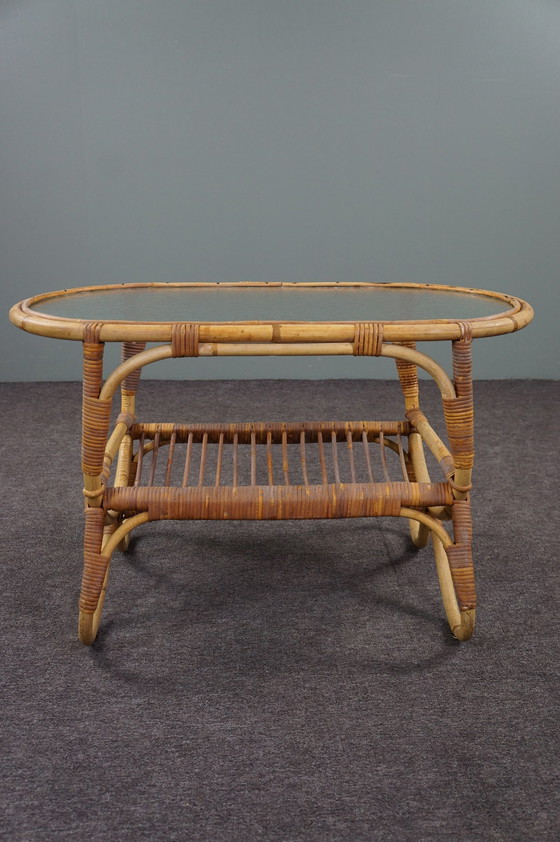 Image 1 of Dutch Design Style coffee table with cloud glass top and reading basket