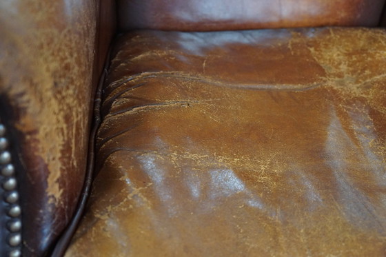 Image 1 of Sheep leather armchair with a worn look