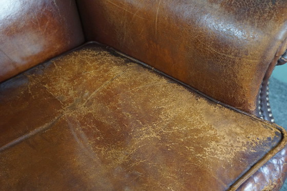 Image 1 of Sheep leather armchair with a worn look