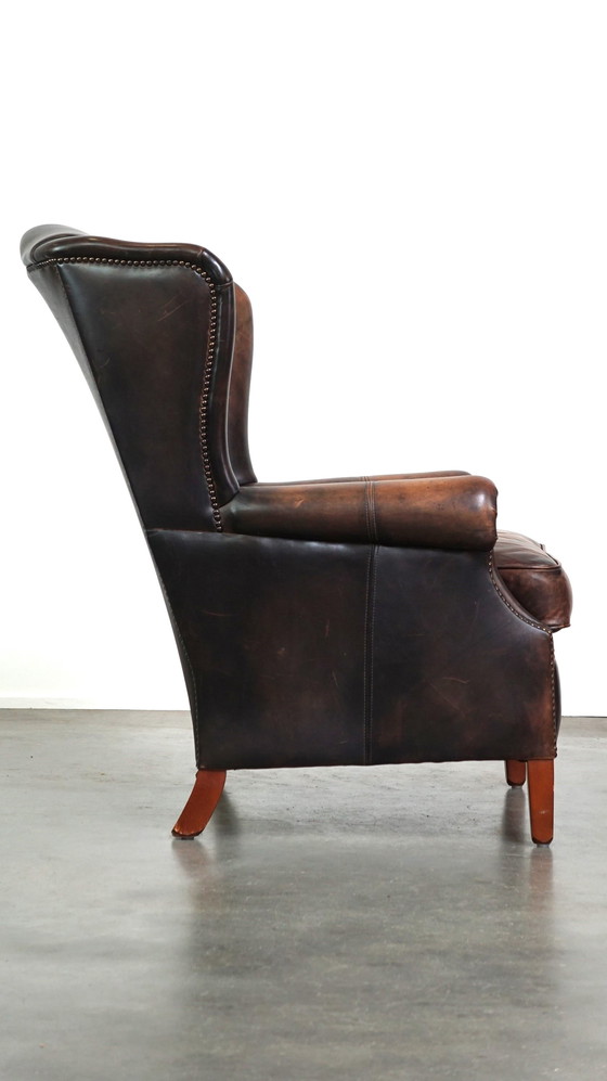 Image 1 of Fauteuil à oreilles en cuir de bœuf