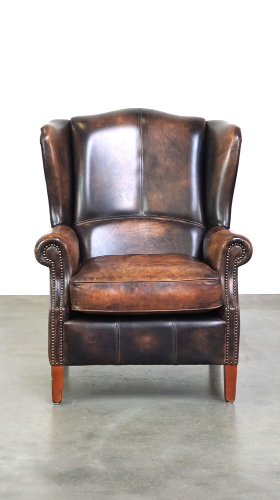 Image 1 of Fauteuil à oreilles en cuir de bœuf