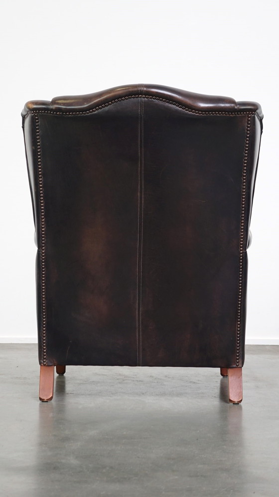 Image 1 of Fauteuil à oreilles en cuir de bœuf