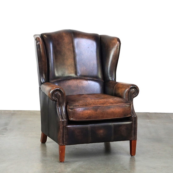 Image 1 of Fauteuil à oreilles en cuir de bœuf