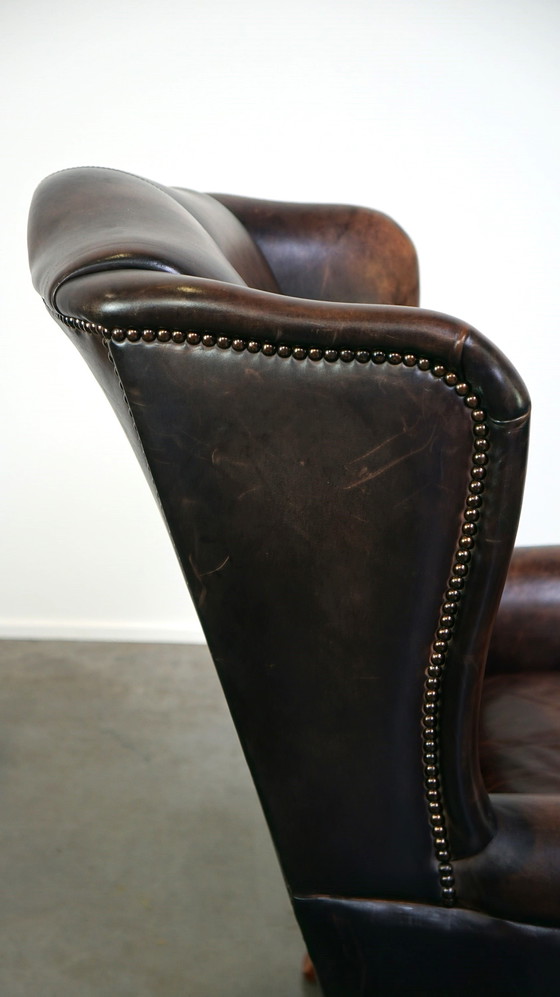 Image 1 of Fauteuil à oreilles en cuir de bœuf