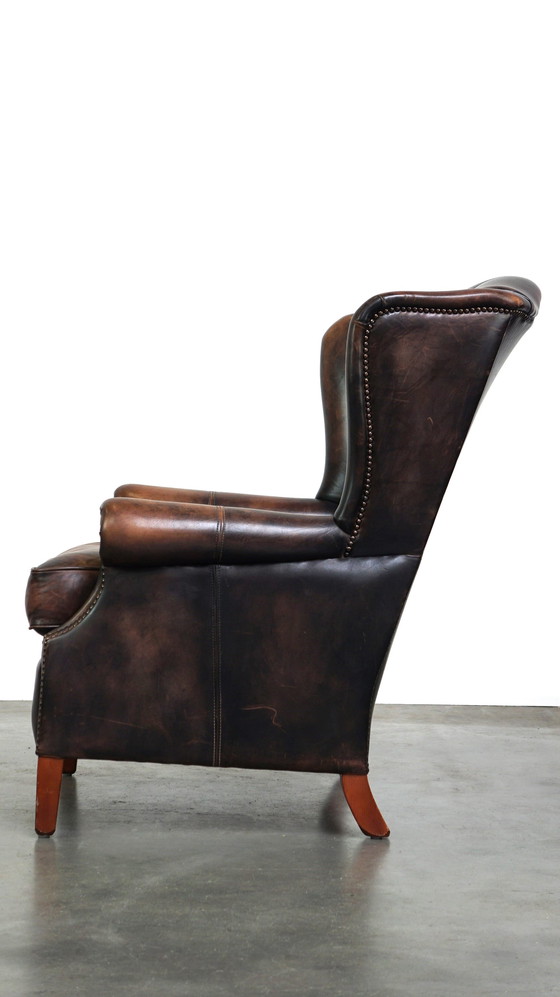 Image 1 of Fauteuil à oreilles en cuir de bœuf