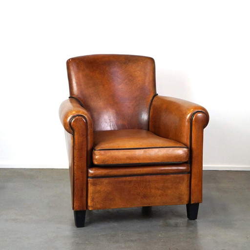 Fauteuil design en peau de mouton/ fauteuil