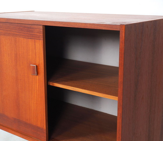 Image 1 of Small teak dresser with sliding doors