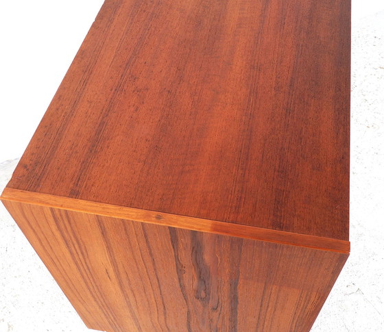 Image 1 of Small teak dresser with sliding doors