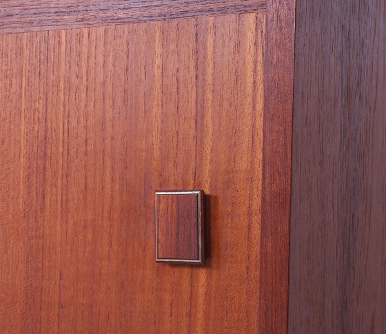 Image 1 of Small teak dresser with sliding doors