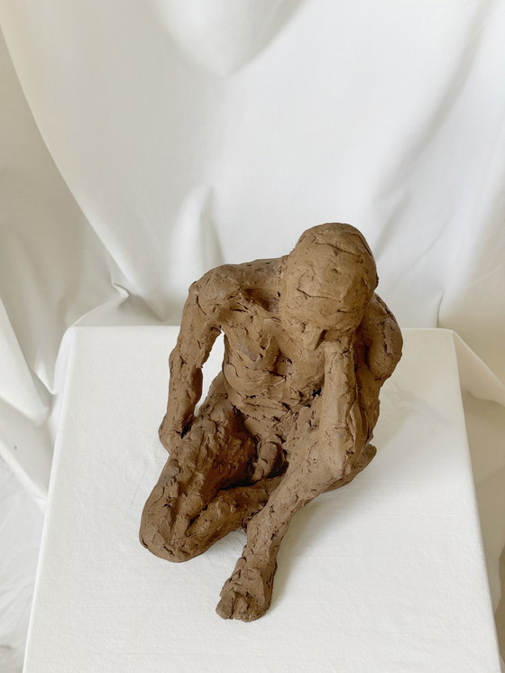 Image 1 of Yolande Ide - a terracotta sculpture of a naked man