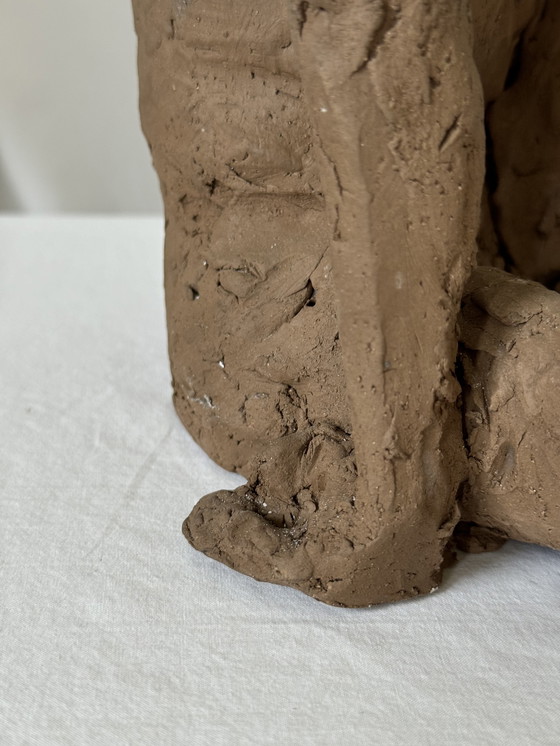 Image 1 of Yolande Ide - a terracotta sculpture of a naked man