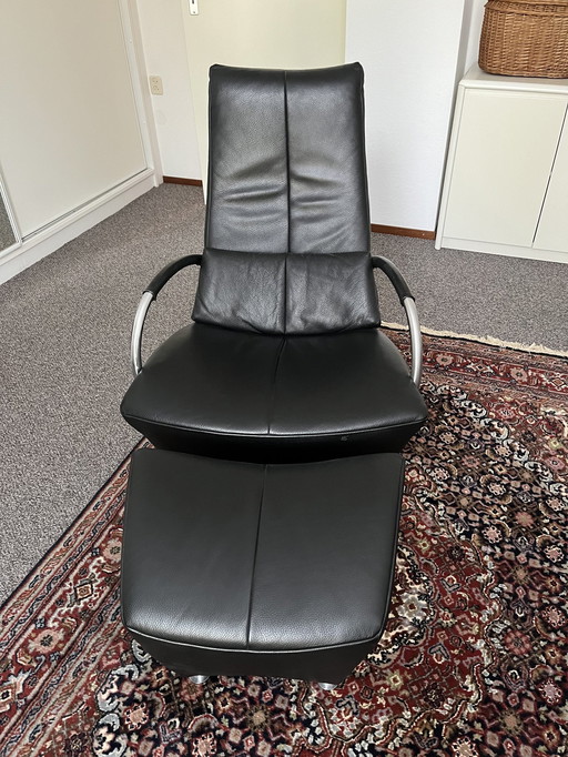 Sitting Vision Leather Recliner With Footstool