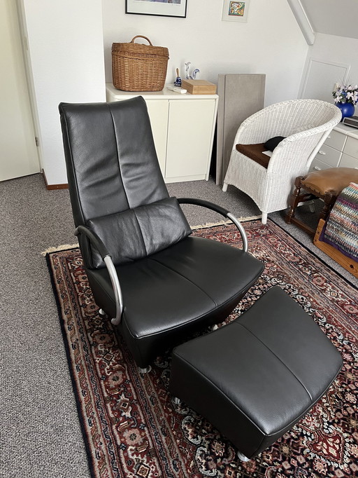 Sitting Vision Leather Recliner With Footstool