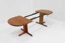 Vintage Danish oval extendable dining table made of solid teak wood 