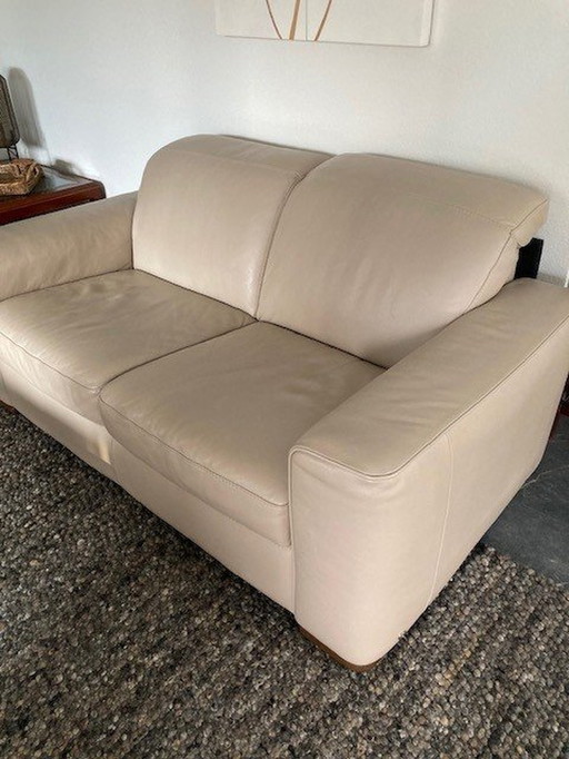 Natuzzi Leather Sofa With Manually Adjustable Headrests.