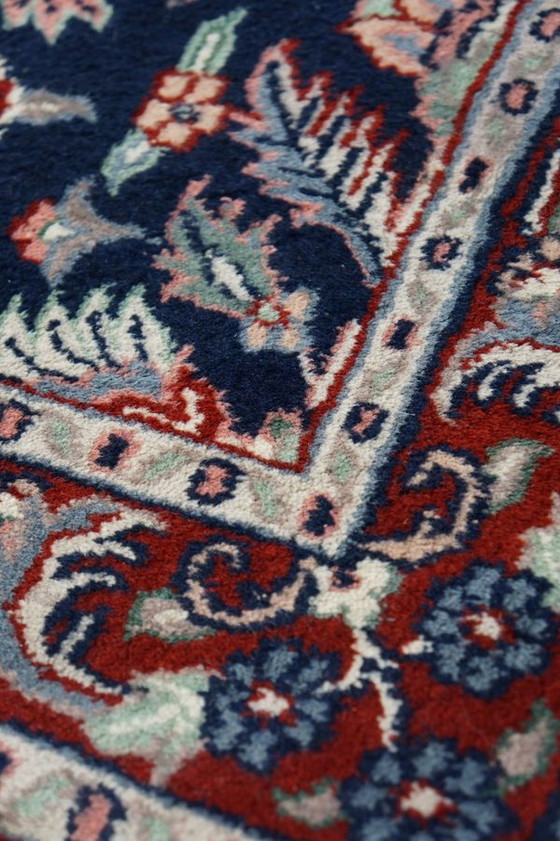 Image 1 of Blue Oriental carpet/ rug with a floral pattern, 150 x 90 cm