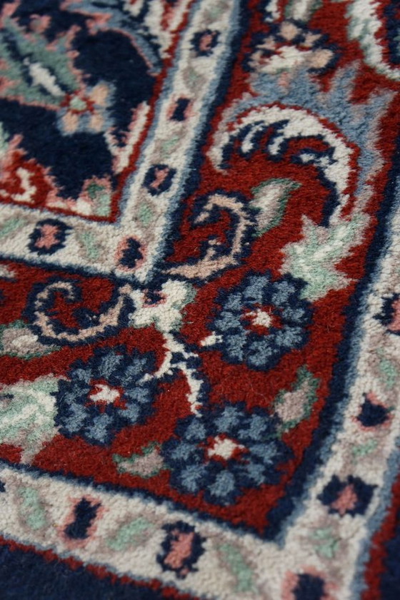 Image 1 of Tapis oriental bleu à motif floral, 150 x 90 cm