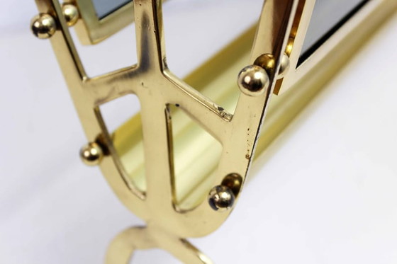 Image 1 of Brass and glass magazine rack from the 1960s