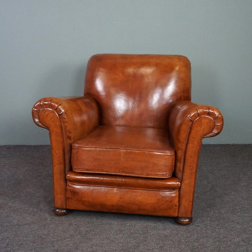 Newly upholstered sheep leather armchair