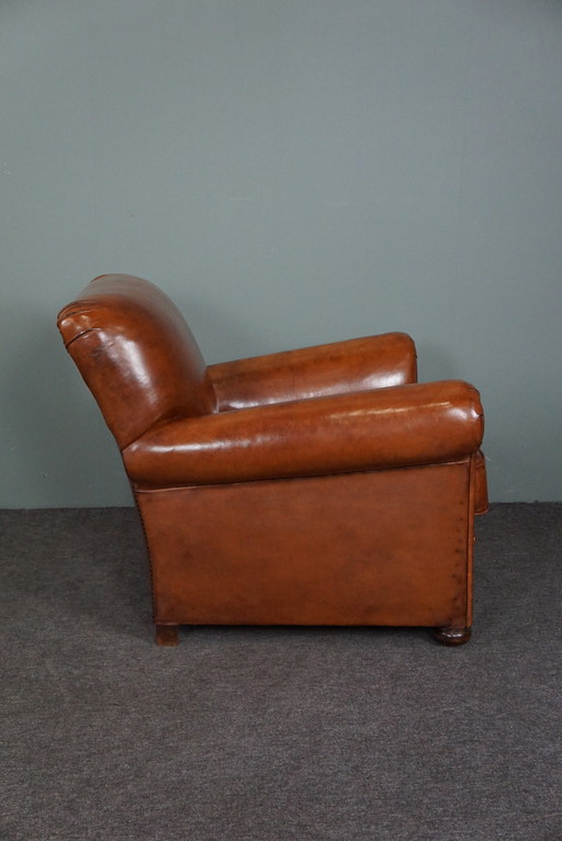 Newly upholstered sheep leather armchair