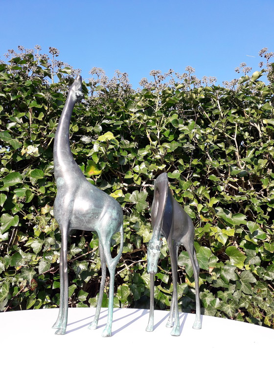 Image 1 of 2 copper figurines of giraffes 46 and 36.5 cm high