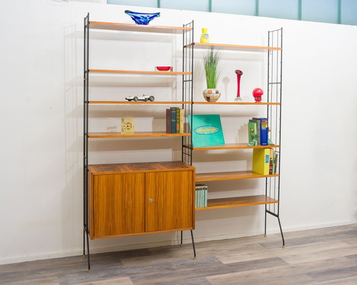 Free-standing shelf, black metal ladders, 60s