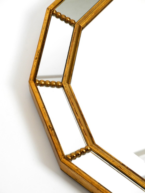 Image 1 of Beautiful Italian 12 sided gold-plated wall mirror with facet cut from the 1960s