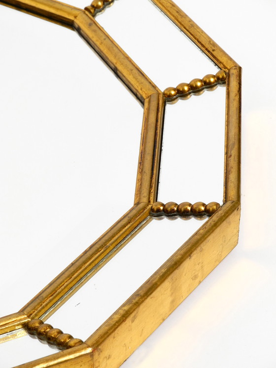 Image 1 of Beautiful Italian 12 sided gold-plated wall mirror with facet cut from the 1960s