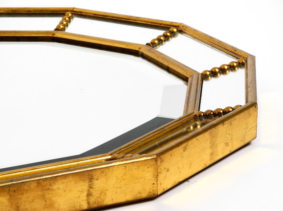 Image 1 of Beautiful Italian 12 sided gold-plated wall mirror with facet cut from the 1960s