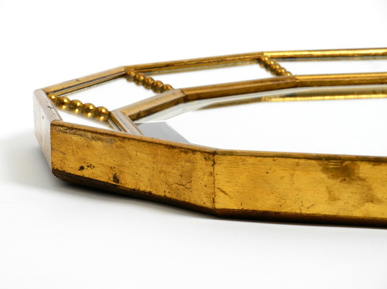 Image 1 of Beautiful Italian 12 sided gold-plated wall mirror with facet cut from the 1960s