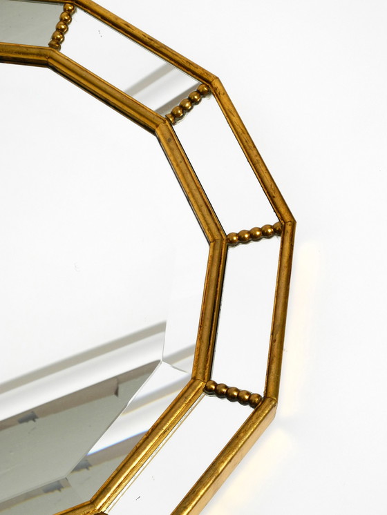 Image 1 of Beautiful Italian 12 sided gold-plated wall mirror with facet cut from the 1960s