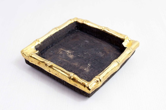 Image 1 of Very elegant ashtray which will quickly find its place on a side table or outdoor furniture.  Very well made, it is made of raw 